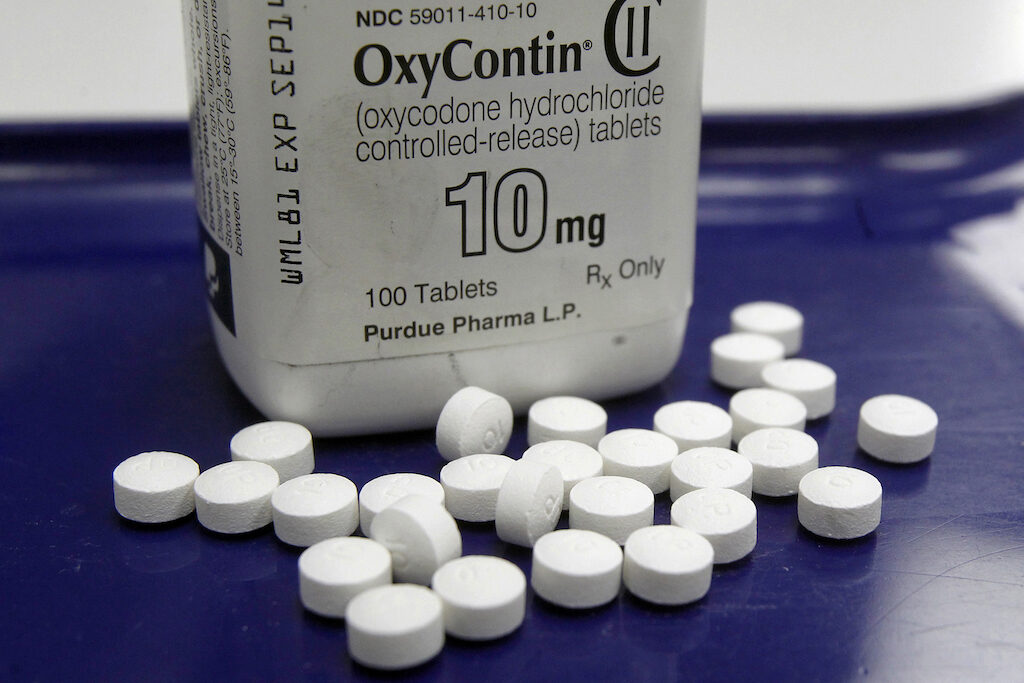 OxyContin This Feb. 19, 2013, file photo shows OxyContin pills arranged for a photo at a pharmacy in Montpelier, Vt. (AP Photo/Toby Talbot, File)