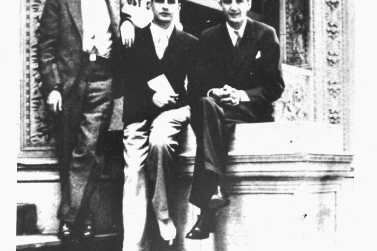 Three students pose for a photo
