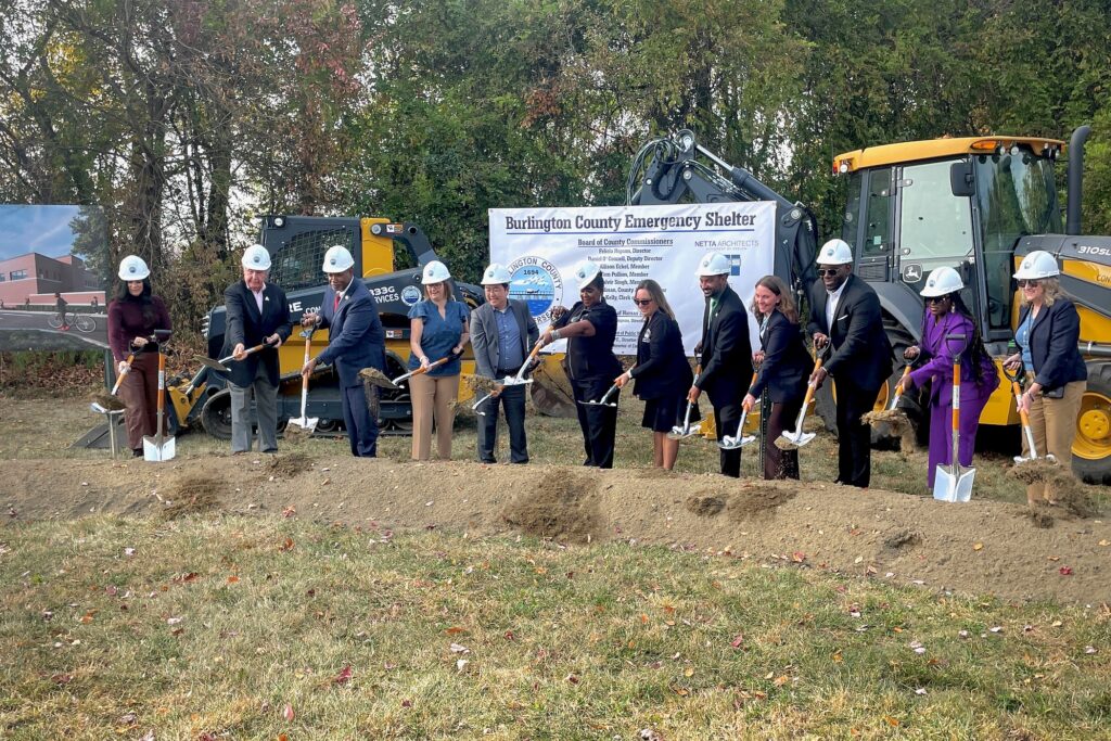 People holding shovels