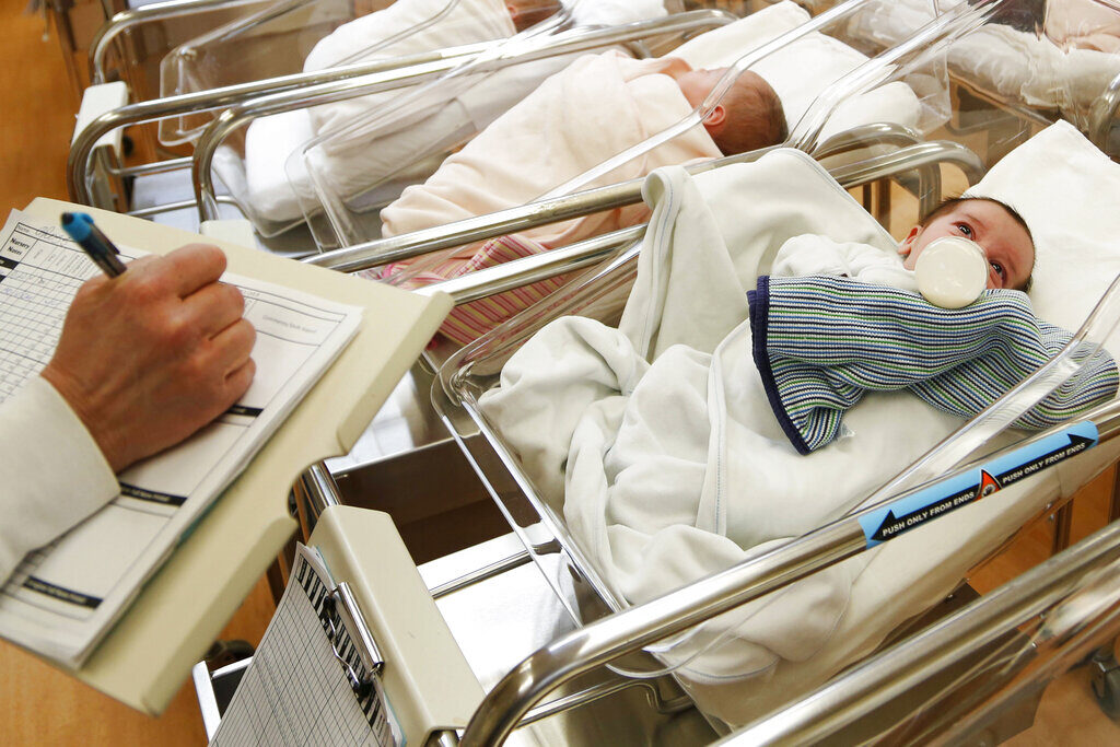 This Feb. 16, 2017 file photo shows newborn babies in the nursery of a postpartum recovery center in upstate New York. U.S. birth rates dropped for the fifth year in a row in 2019, producing the smallest number of babies in 35 years, according to numbers which were released Wednesday, May 20, 2020, by the Centers for Disease Control and Prevention. (AP Photo/Seth Wenig, File)
