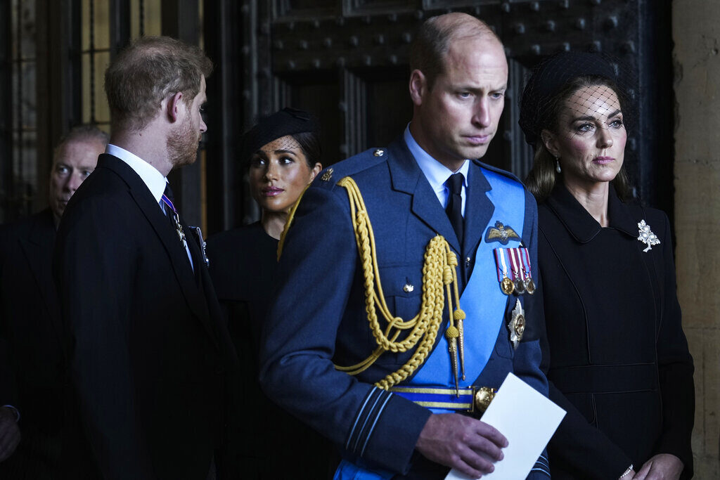 Britain's Prince William, second right, Kate, Princess of Wales, right, Prince Harry, left, and Meghan, Duchess of Sussex, second left, leave after they paid their respects to Queen Elizabeth II lying in state at Westminster Hall, in London, Wednesday, Sept. 14, 2022. (AP Photo/Emilio Morenatti)
