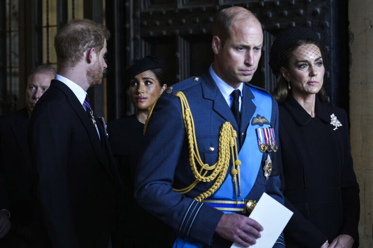 Britain's Prince William, second right, Kate, Princess of Wales, right, Prince Harry, left, and Meghan, Duchess of Sussex, second left, leave after they paid their respects to Queen Elizabeth II lying in state at Westminster Hall, in London, Wednesday, Sept. 14, 2022. (AP Photo/Emilio Morenatti)