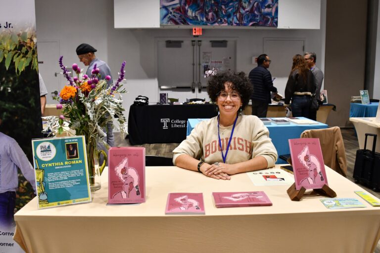 Cynthia Roman Cabrera at a booth