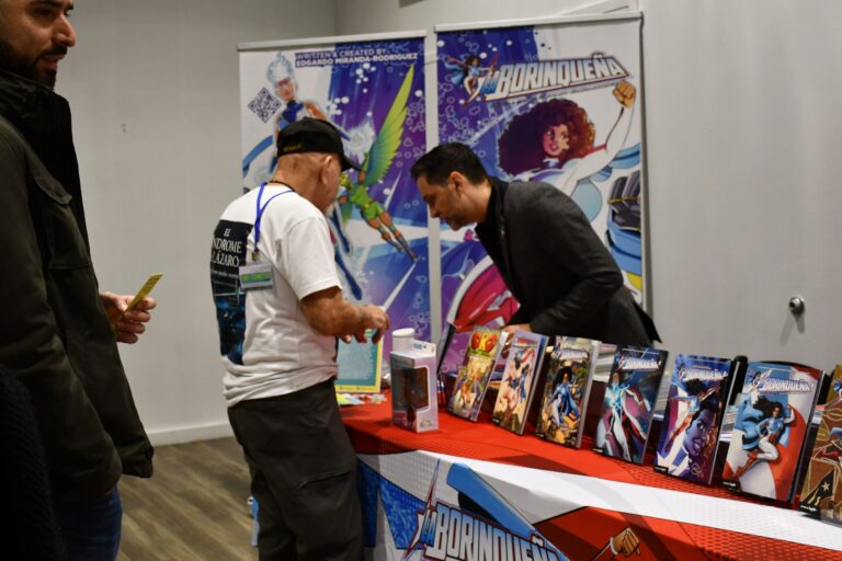 Edgardo Miranda-Rodriguez at a booth