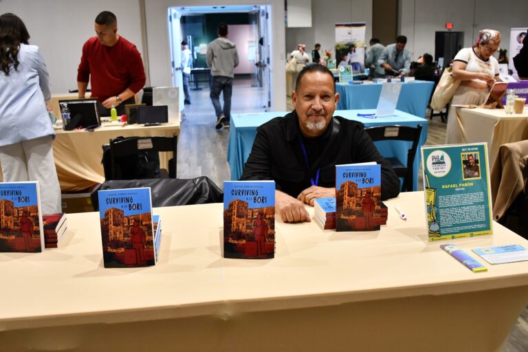 Rafael Pabón Ortega at a booth
