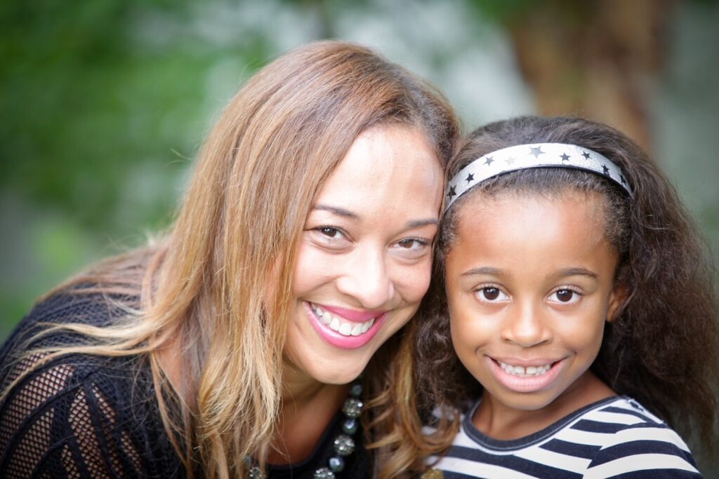 Michelle and Gabrielle Michelle Hord and her daughter smile
