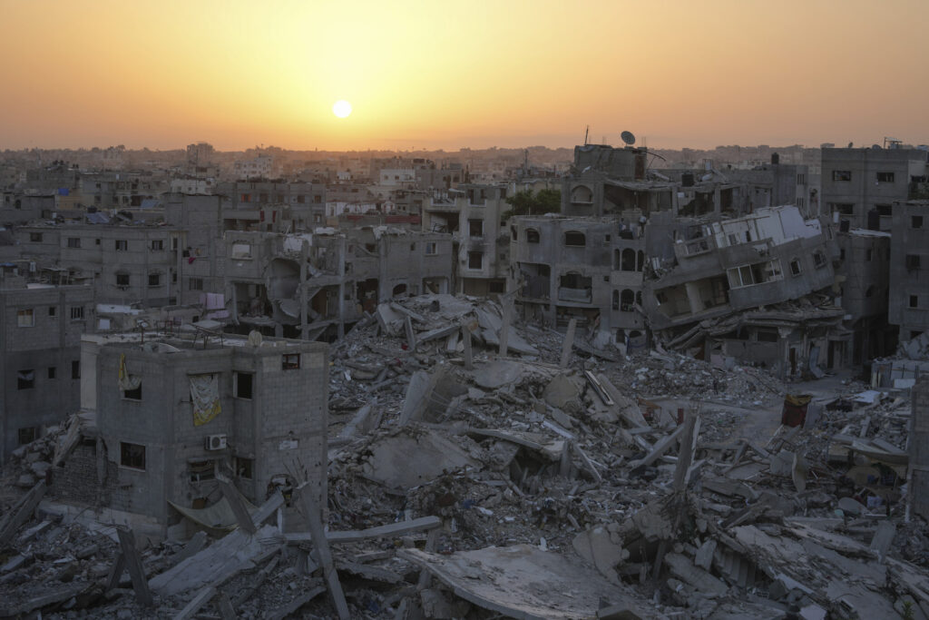 Mideast War Anniversary Photo Gallery destroyed city after a bombing