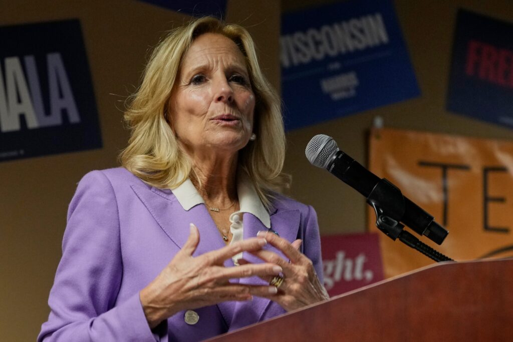 jill-biden-2024-10-14 Jill Biden speaks behind a podium