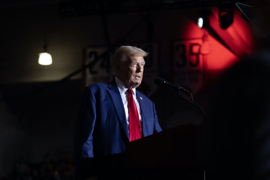 Former President Donald Trump speaks to supporters during a campaign event at Saginaw Valley State University on Oct. 3 in Saginaw, Mich.