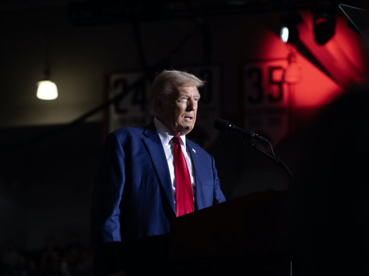 Former President Donald Trump speaks to supporters during a campaign event at Saginaw Valley State University on Oct. 3 in Saginaw, Mich.