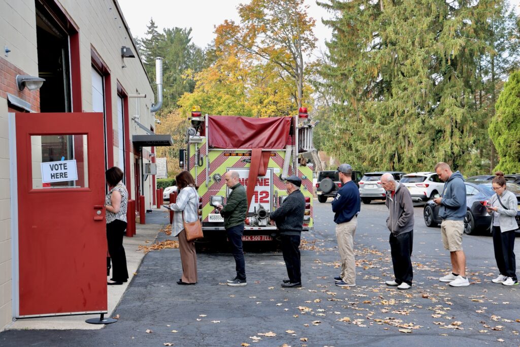 A voter line stretches out of the firehouse on Main Street in Moorestown Township, New Jersey.