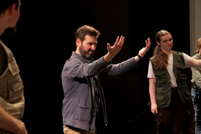 Nick Provenzale directs a rehearsal of the opera ''Alice Tierney'' at West Chester University's Asplundh Concert Hall. (Emma Lee/WHYY)