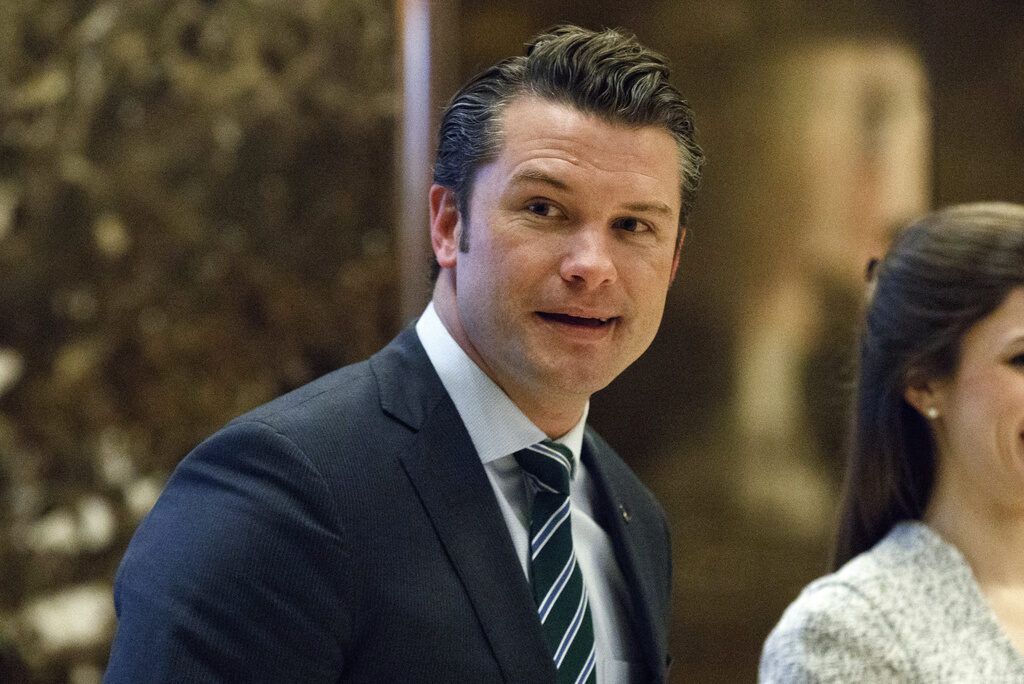 Pete Hegseth FILE - Pete Hegseth walks to an elevator for a meeting with President-elect Donald Trump at Trump Tower in New York, Dec. 15, 2016. (AP Photo/Evan Vucci, File)