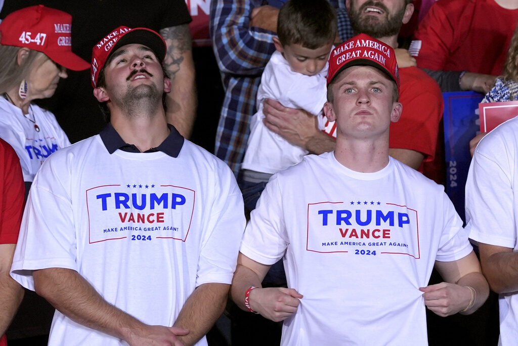 Donald Trump FILE - Supporters watch as Republican presidential nominee former President Donald Trump speaks at a campaign rally, Nov. 5, 2024, in Grand Rapids, Mich. (AP Photo/Evan Vucci, File)