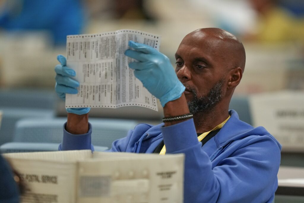 APTOPIX Election 2024 America Votes Pennsylvania An election worker processes mail ballots for the 2024 general election at the Philadelphia election warehouse, Tuesday, Nov. 5, 2024, in Philadelphia.