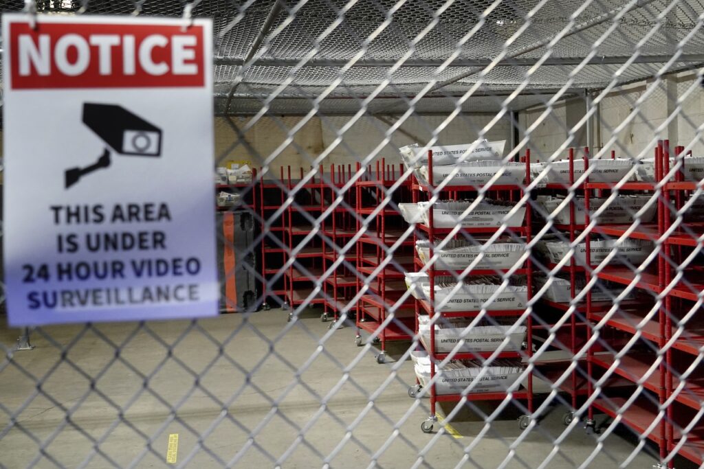 PA-Election 2024-Ballot Transport-Explainer mail ballots behind a cage