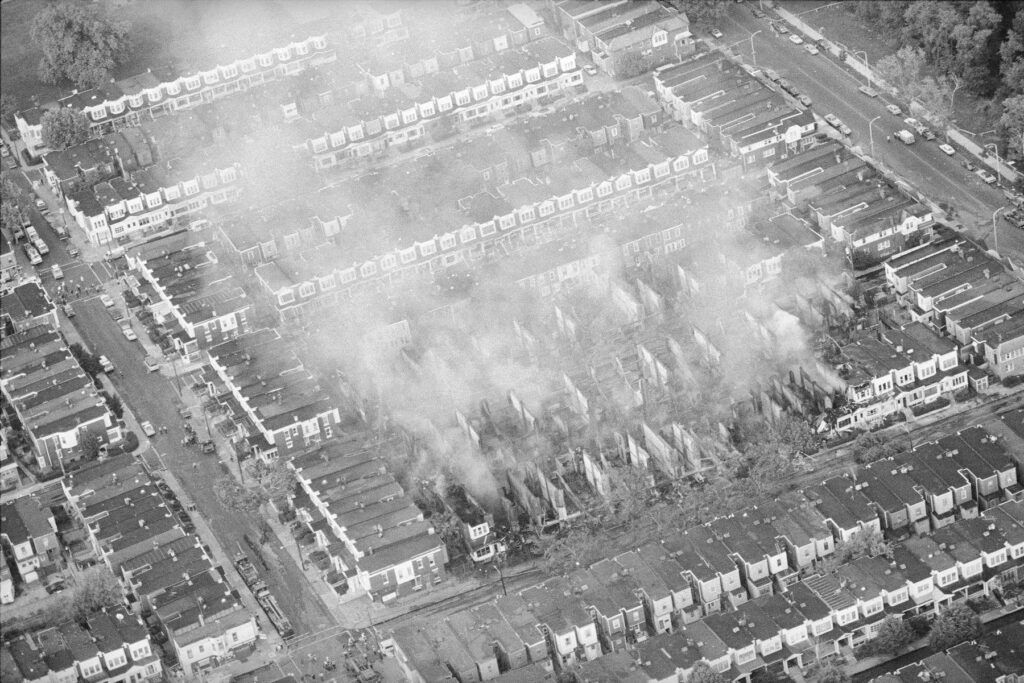 US MOVE Bombing Remains Smoke rises from the ashes of a West Philadelphia neighborhood, May 4, 1985, the morning after a siege between Philadelphia police and members of the radical group MOVE left 11 people dead and 61 homes destroyed