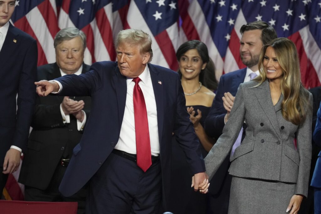 Donald Trump Republican Presidential nominee former President Donald Trump holds hands with former first lady Melania Trump after speaking to supporters at the Palm Beach County Convention Center during an election night watch party, Wednesday, Nov. 6, 2024, in West Palm Beach, Fla.