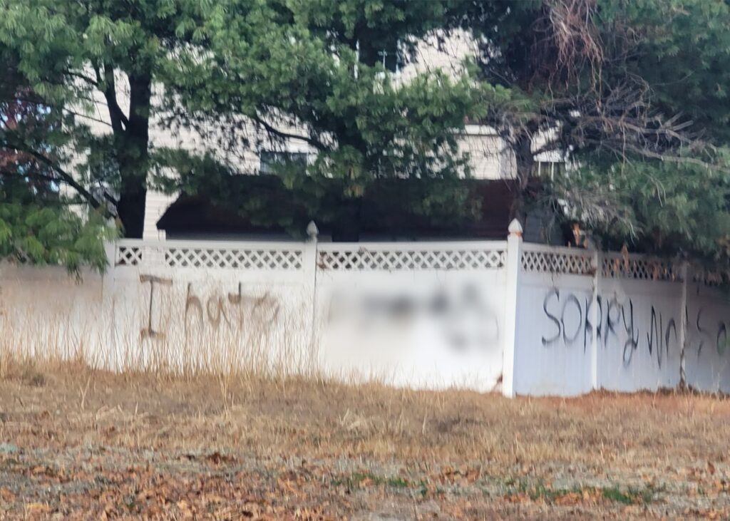 graffiti-lawnside-2024 racist graffiti on a fence