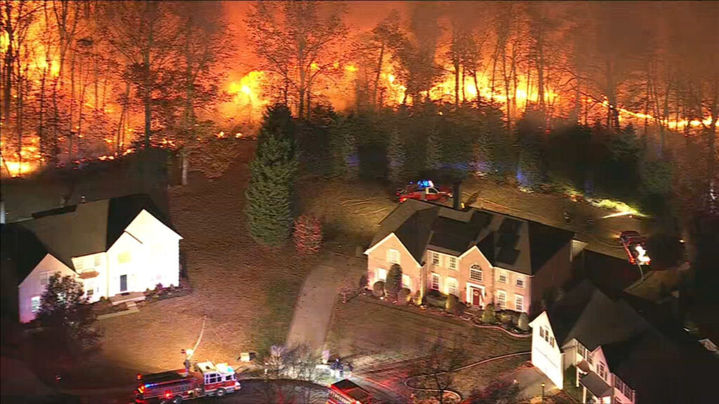 hainesport-new-jersey-wildfire-2024-11-18 A wildfire burning near homes