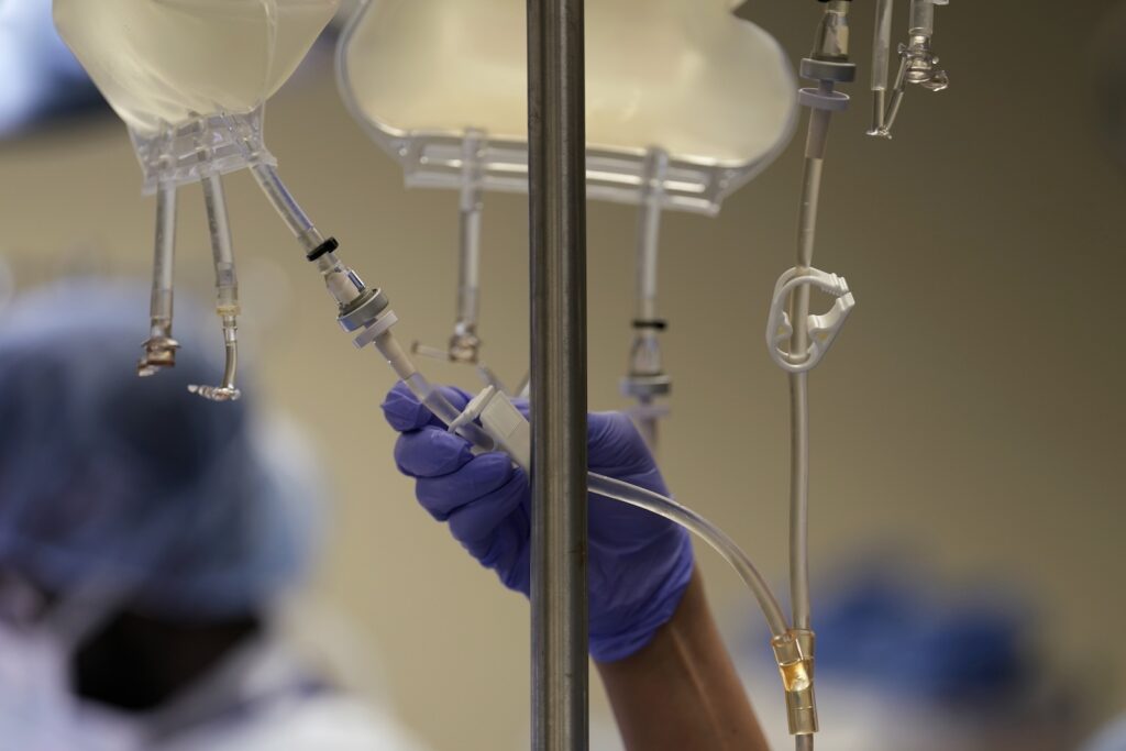 Medicaid Employer Help Fluids are controlled in an operating room in a hospital.