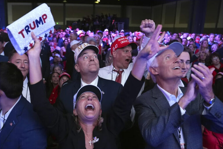 Supporters watch returns at a campaign election night watch party for Republican presidential nominee former President Donald Trump at the Palm Beach Convention Center. (Evan Vucci/AP/AP)