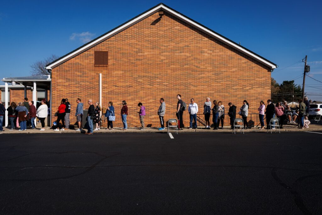 TOPSHOT-US-VOTE-POLITICS-ELECTION People on line at polling place