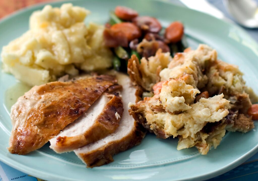 a plate of Thanksgiving food