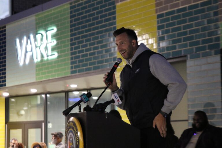 Connor Barwin speaks behind a podium