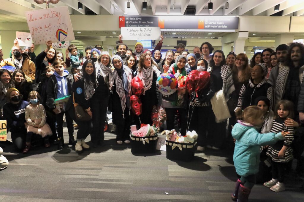 A large group photo in the airport