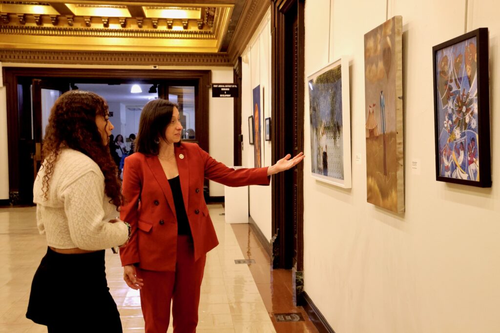 2024 12 18-e lee-nijah blanton rue landau-philadelphia city hall-transcending uncertainty exhibit uarts Rue Landau looks at a work by Nijah Monique Blanton with Blanton
