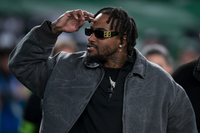 Former Philadelphia Eagles receiver DeSean Jackson salutes a crowd