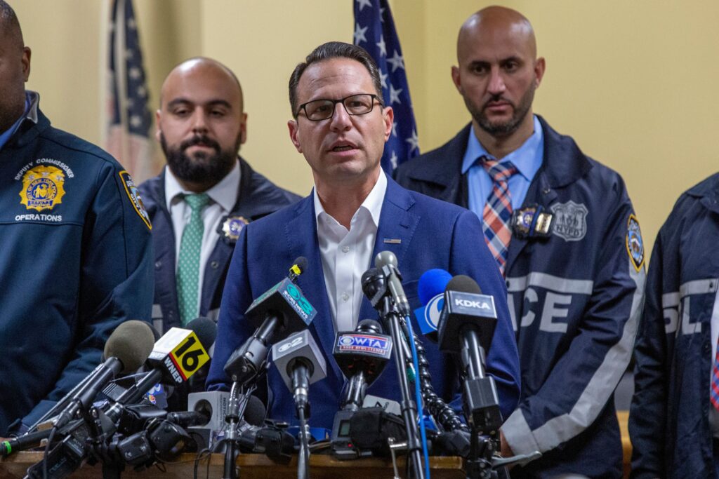 Josh-shapiro-2024-12-09 Gov. Josh Shapiro, center, speaks during a press conference regarding the arrest of suspect Luigi Mangione, Monday, Dec. 9, 2024, in Hollidaysburg, Pa., in the fatal shooting of UnitedHealthcare CEO Brian Thompson.