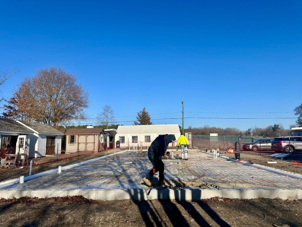 georgetown-delaware-pallet-center-2024-4 people working on the foundation of the new center