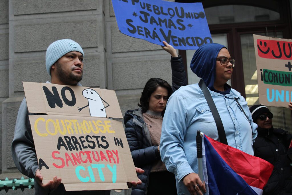 juntos-4 copy Dozens rally at City Hall on Dec. 10, 2024, calling on Philadelphia elected officials to reaffirm sanctuary city protections for undocumented residents.