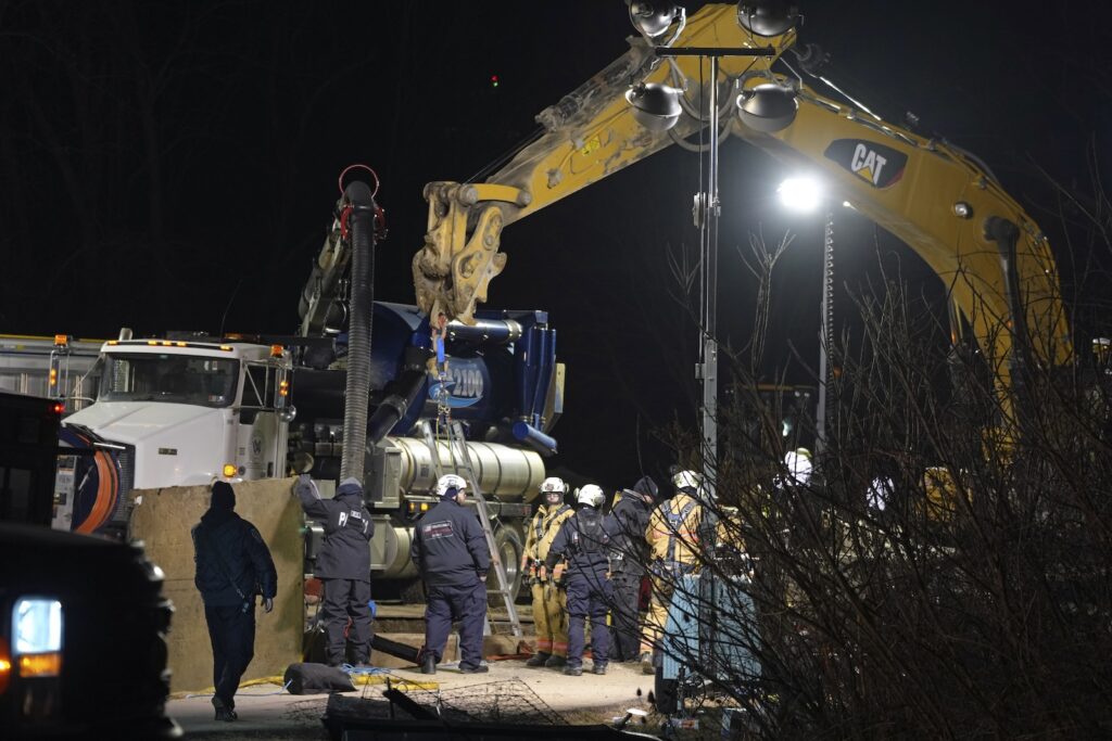 Missing Woman Sinkhole Search Rescue workers search through the night in a sinkhole for Elizabeth Pollard, who disappeared while looking for her cat, in Marguerite, Pa., Tuesday, Dec. 3, 2024.