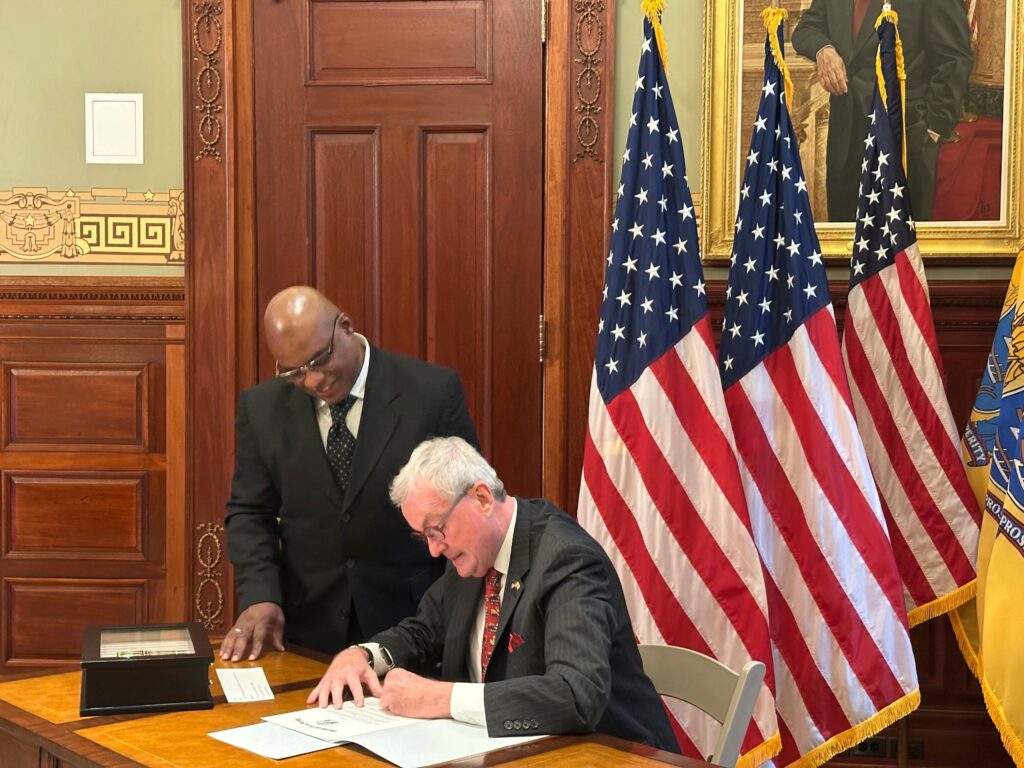 Gov. Phil Murphy signs a pardon