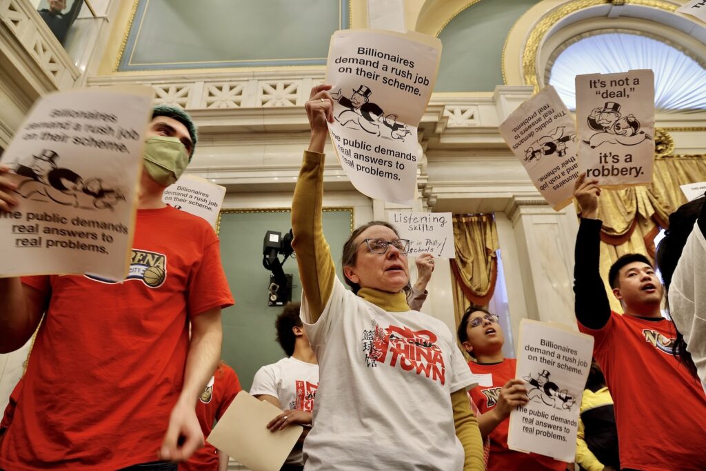 sixers-arena-vote-philadelphia-city-council-protest-EL-121224-02 Sixers arena opponents chant as City Council weighs whether to approve a preliminary bill that would allow a new arena to be built on Market Street.