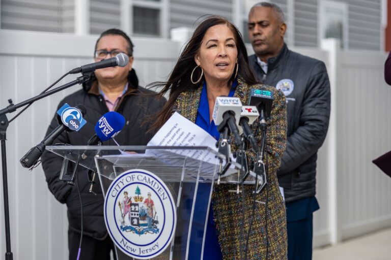 Jannette Ramos speaking at a podium