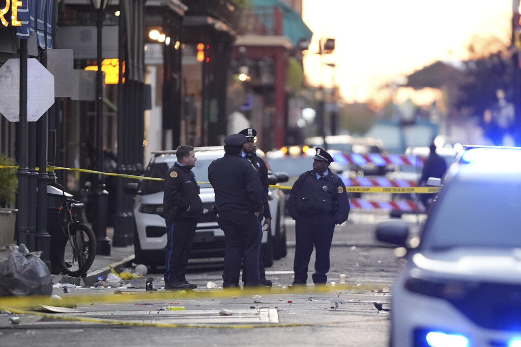 New Orleans Car Into Crowd Emergency services attend the scene on Bourbon Street after a vehicle drove into a crowd on New Orleans' Canal and Bourbon Street, Wednesday Jan. 1, 2025. (AP Photo/Gerald Herbert)