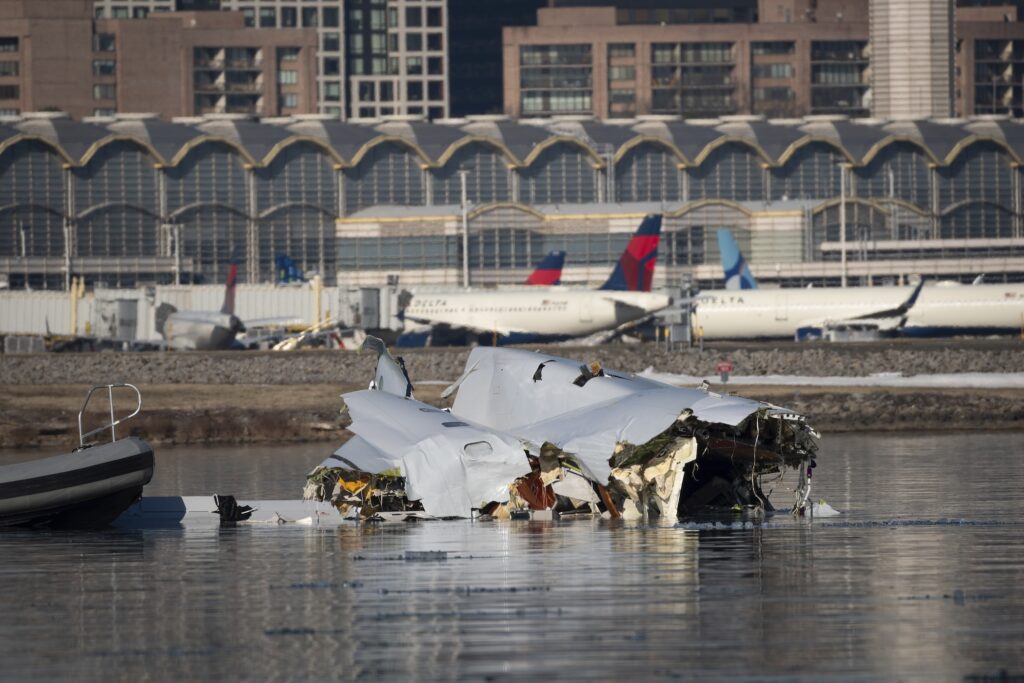 APTOPIX Aircraft Down wreckage from the plane crash in the river