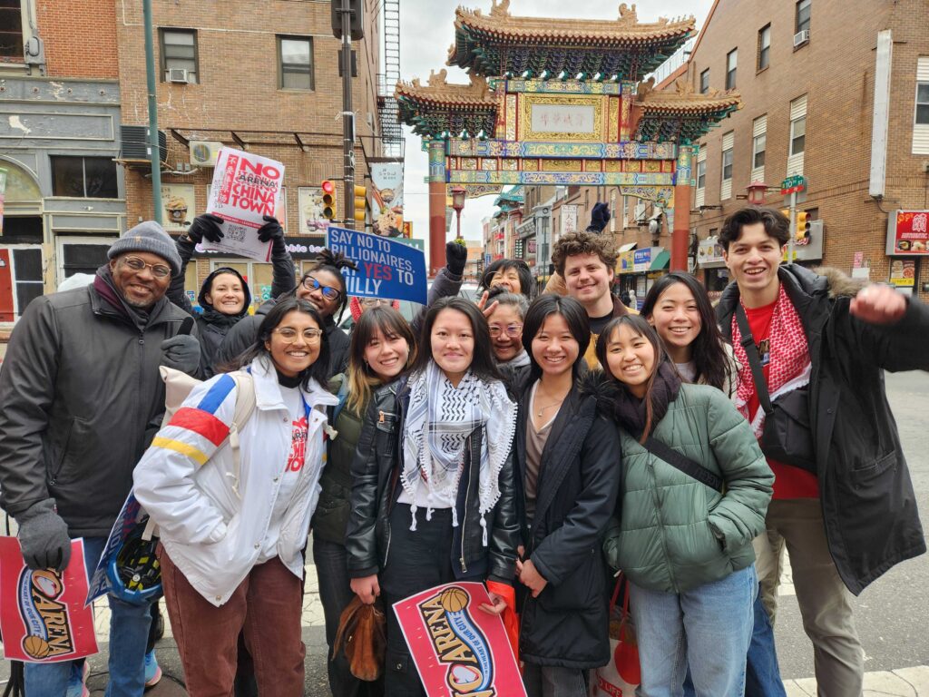 chinatown-activists-sixers-arena-2025-01-13 No Arena Coalition activists smile for a picture