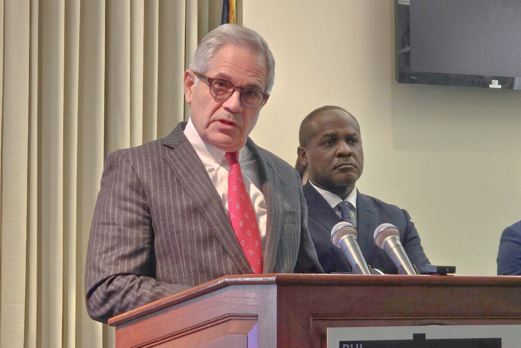 da-krasner-t-macdonald-2025-01-07 Larry Krasner speaking at a podium