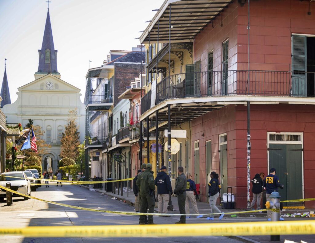New Orleans Car Into Crowd The FBI investigates the area on Orleans St and Bourbon Street by St. Louis Cathedral in the French Quarter where a suspicious package was detonated after a person drove a truck into a crowd earlier on Bourbon Street on Wednesday, Jan. 1, 2025.