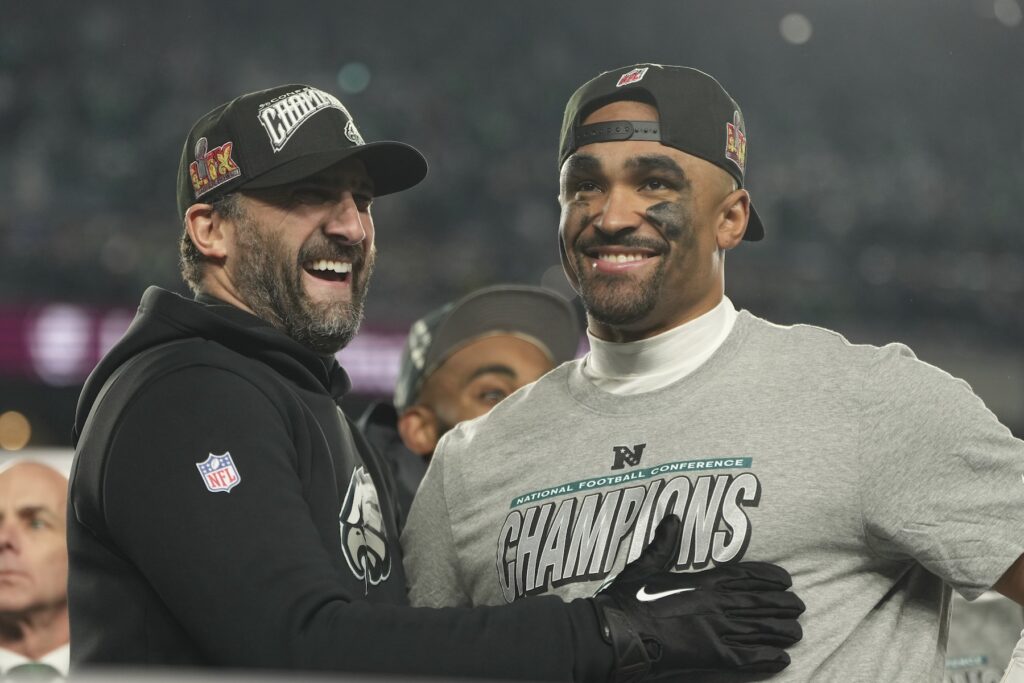 Commanders Eagles Football Philadelphia Eagles coach Nick Sirianni, left, and quarterback Jalen Hurts