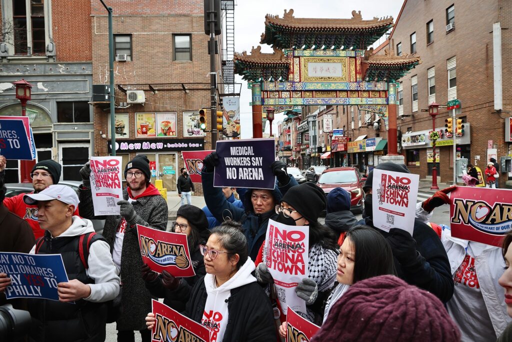 sixers-arena-opponents-2-2025-01-13 Arena opponents gather and hold signs reading NO ARENA IN CHINATOWN and MEDICAL WORKERS SAY NO ARENA