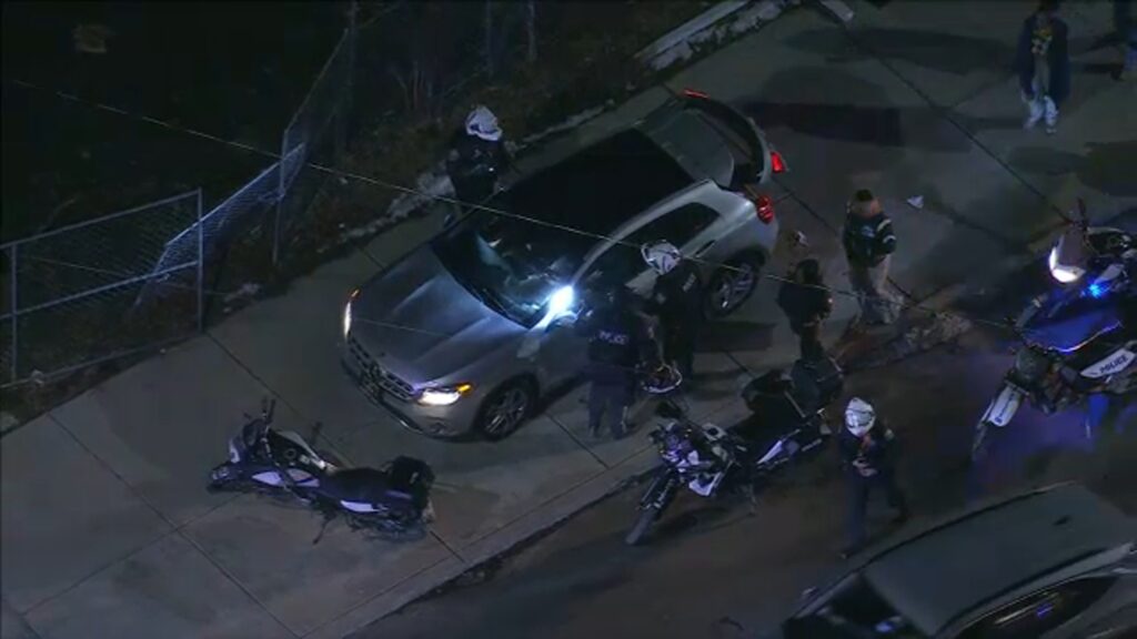 spring-garden-crash-2025-01-26 police look into a car
