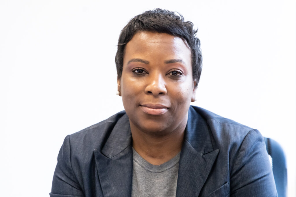 Ayanna Greene-Davis sitting at her desk