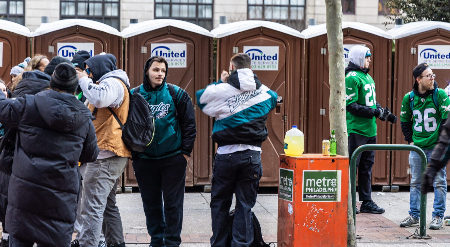 Eagles fans take advantage of the ample portable toilets around the Center City area during the Eagles parade on February 14, 2025.