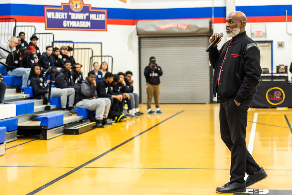 02 24 2025 k paynter 14 annual raising kings conference_ Dorrell Green addressing the audience sitting in the bleachers
